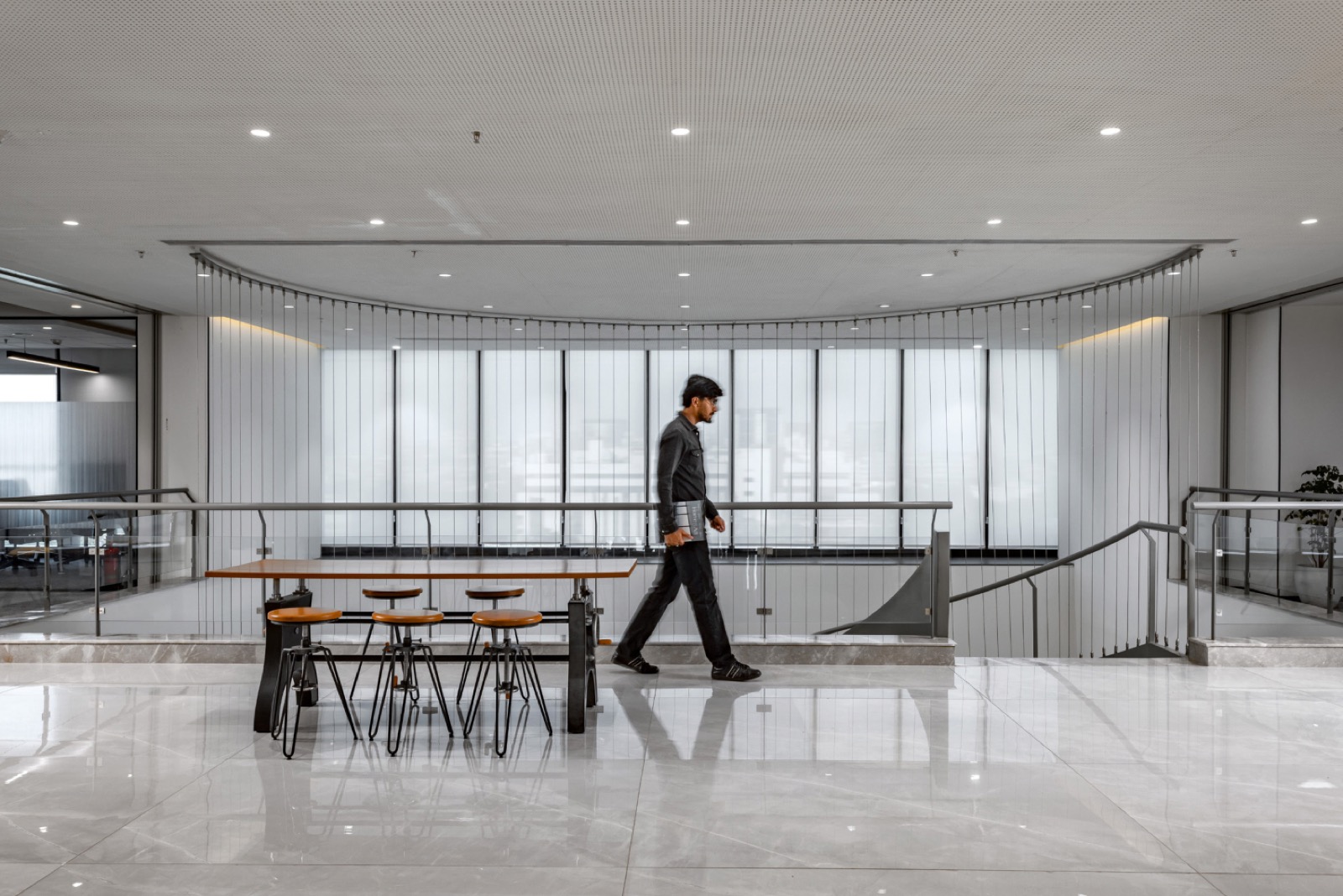 Open workspace corridor by OfficeBanao